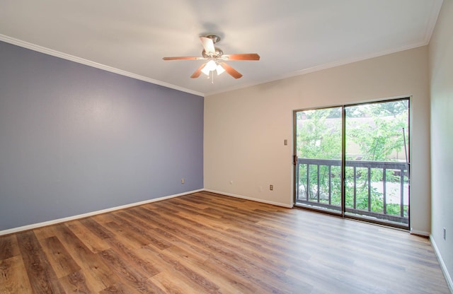 spare room with crown molding, hardwood / wood-style floors, and ceiling fan