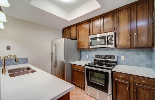 kitchen featuring tasteful backsplash, ornamental molding, stainless steel appliances, sink, and light tile patterned flooring