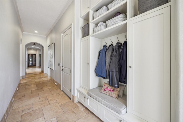 mudroom featuring ornamental molding