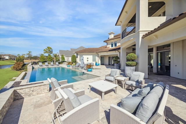 view of pool with a patio