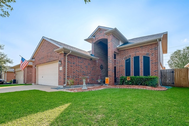 view of front facade featuring a garage and a front yard