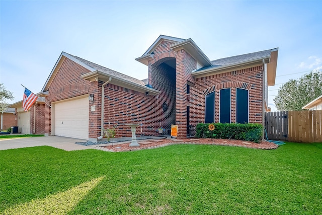 view of front facade featuring a front lawn and a garage