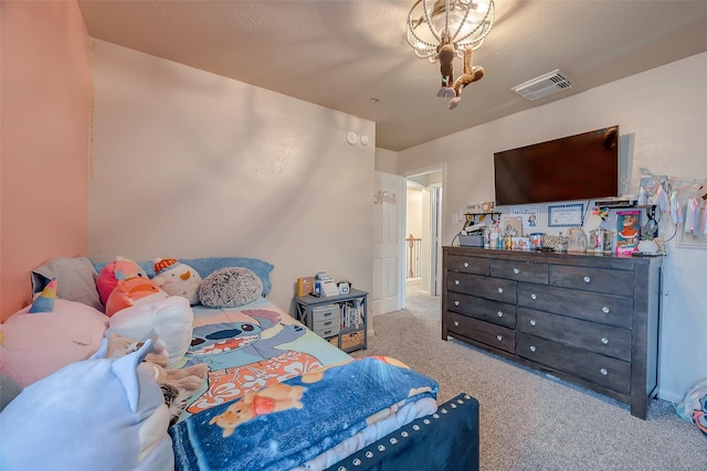 bedroom with light colored carpet