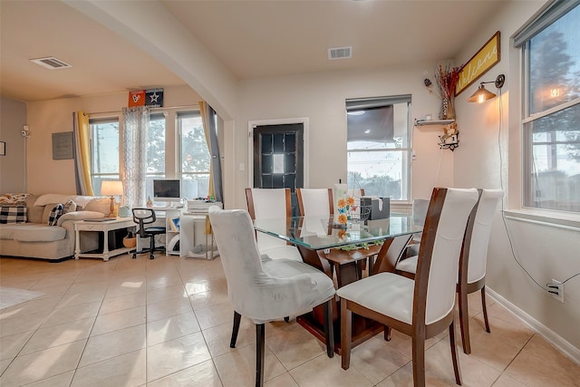 dining room with light tile patterned floors