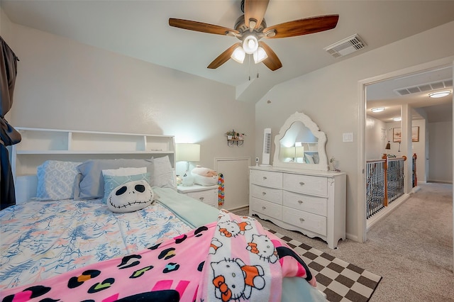 bedroom with light colored carpet, ceiling fan, and lofted ceiling