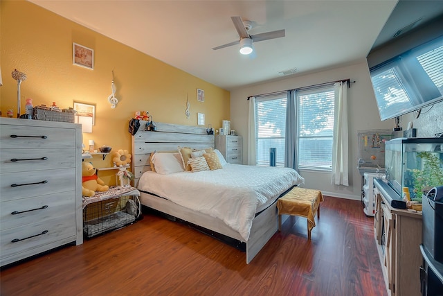 bedroom featuring ceiling fan and dark wood-type flooring