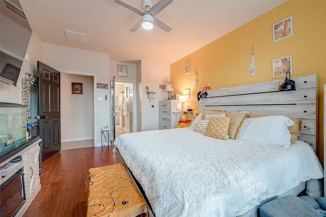 bedroom featuring ceiling fan and dark wood-type flooring