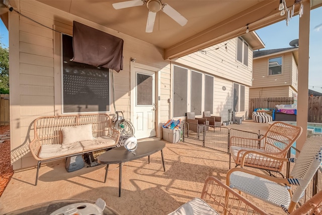 view of patio featuring an outdoor hangout area and ceiling fan