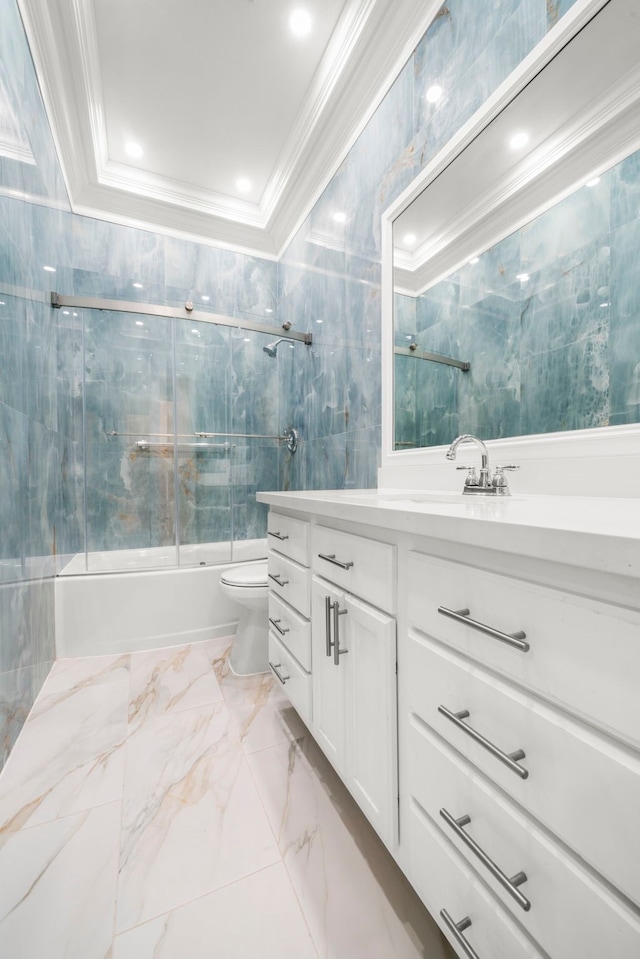 full bathroom with vanity, enclosed tub / shower combo, tile walls, and toilet