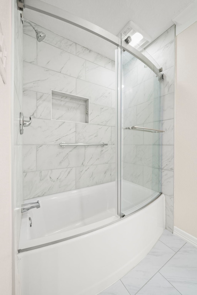 bathroom featuring enclosed tub / shower combo