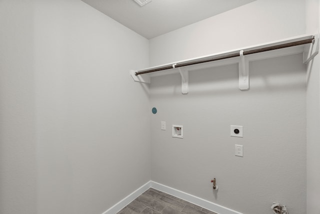 washroom with hookup for an electric dryer, washer hookup, and gas dryer hookup