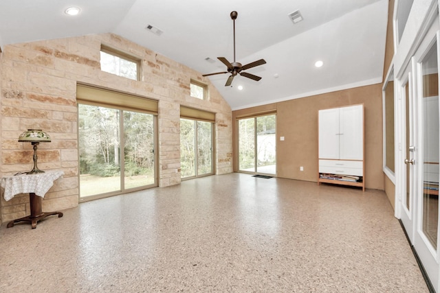 interior space with ceiling fan, high vaulted ceiling, and a wealth of natural light