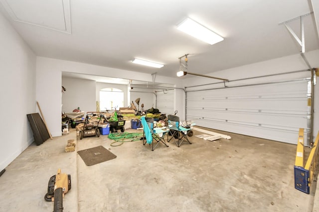 garage featuring a garage door opener