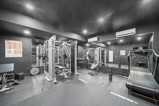 gym featuring a wall unit AC