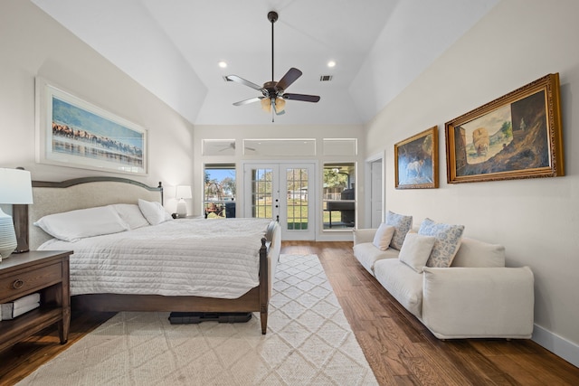 bedroom with french doors, access to outside, ceiling fan, high vaulted ceiling, and hardwood / wood-style floors