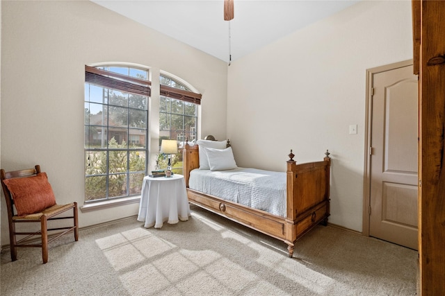 bedroom with ceiling fan and carpet floors