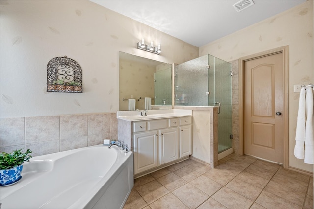 bathroom with vanity, separate shower and tub, and tile patterned floors