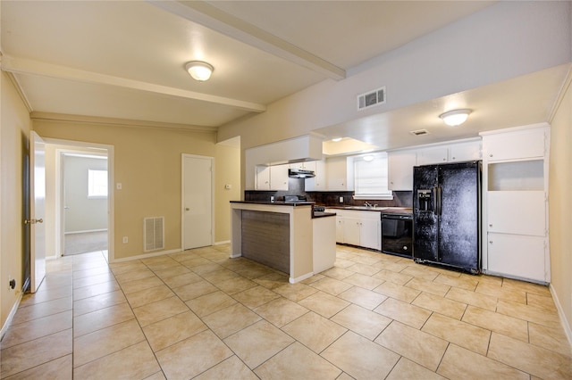 kitchen with beamed ceiling, light tile patterned flooring, decorative backsplash, white cabinets, and black appliances