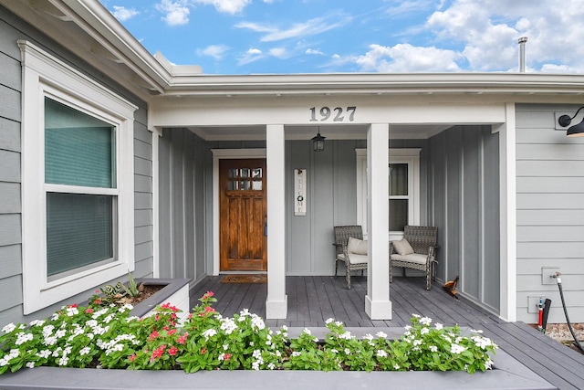 doorway to property with a porch