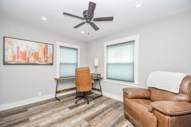 office area featuring light wood-type flooring and ceiling fan