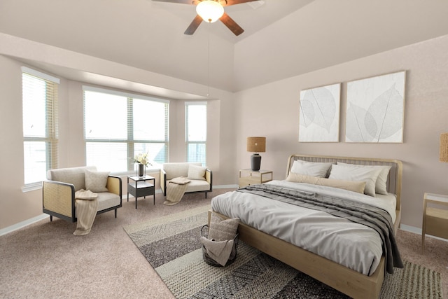 carpeted bedroom with multiple windows, high vaulted ceiling, and ceiling fan