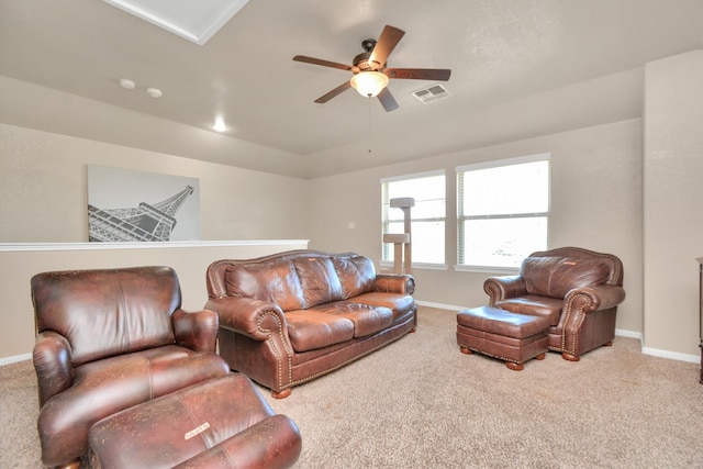 9614 Hideaway Green Dr, Richmond, TX 77406 - living room with baseboards, visible vents, ceiling fan, and carpet flooring