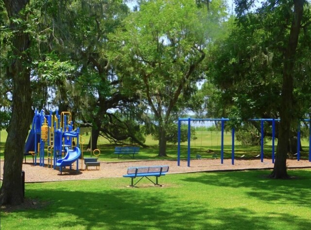 view of jungle gym featuring a yard