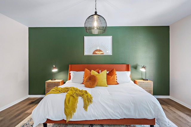 bedroom featuring wood-type flooring