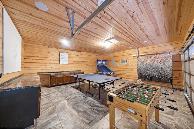 game room with wood ceiling and wood walls