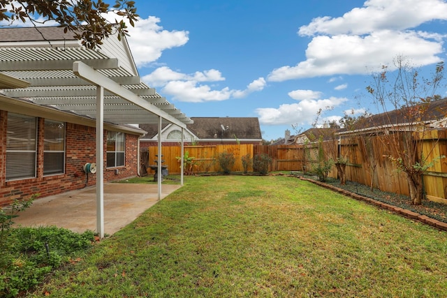 view of yard featuring a pergola and a patio area