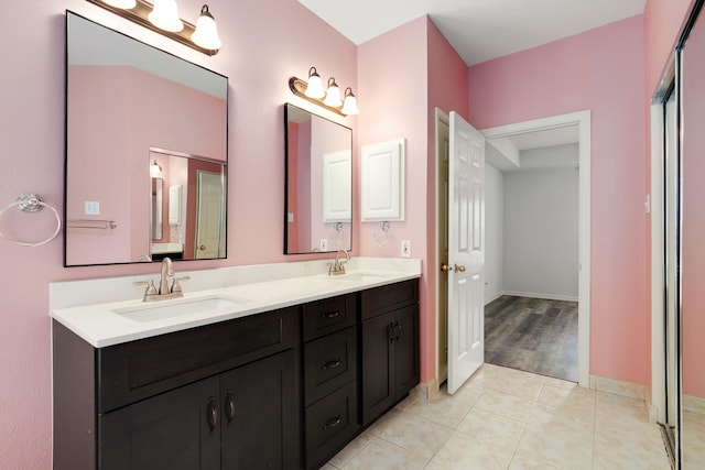 bathroom featuring vanity and tile patterned floors