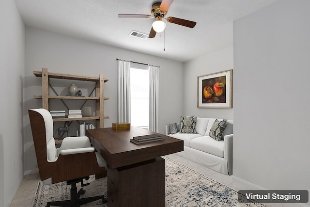 tiled home office with ceiling fan