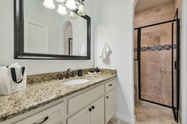 bathroom with vanity, tile patterned floors, and an enclosed shower