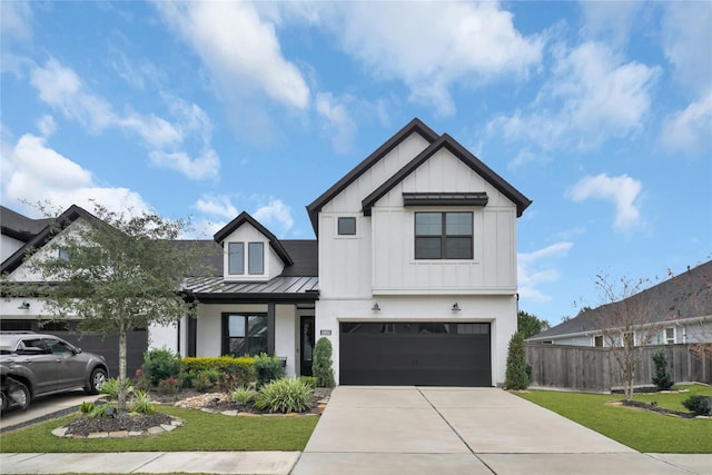 modern farmhouse with a garage and a front yard