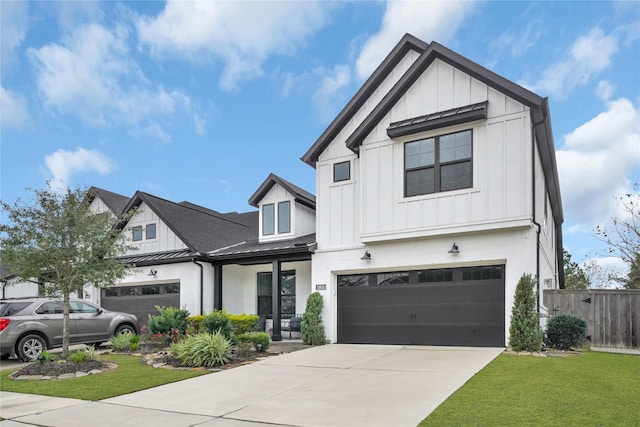 modern farmhouse style home with a front yard and a garage