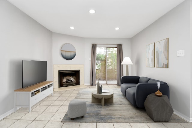 tiled living room featuring a high end fireplace