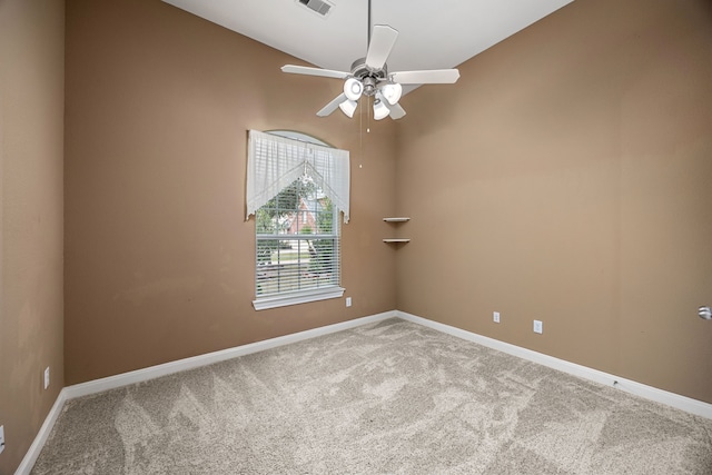 empty room with carpet flooring, ceiling fan, and lofted ceiling