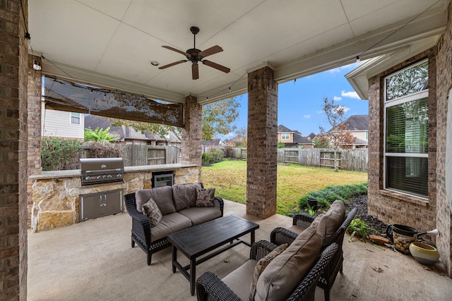 view of patio / terrace with outdoor lounge area, wine cooler, a grill, ceiling fan, and area for grilling