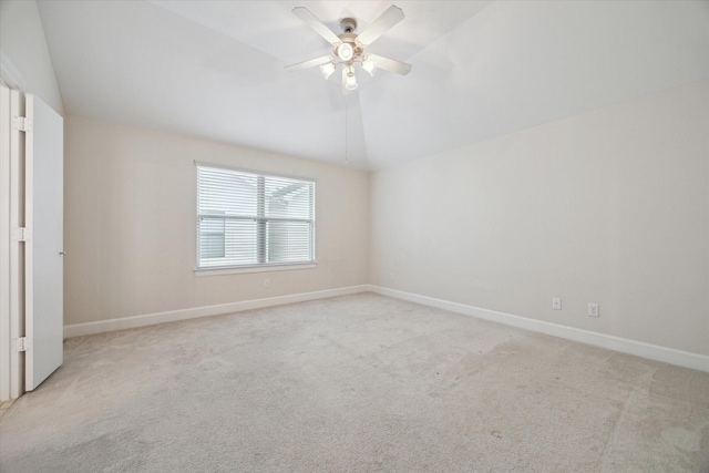 unfurnished room with light carpet, ceiling fan, and lofted ceiling