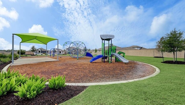 view of play area featuring a lawn