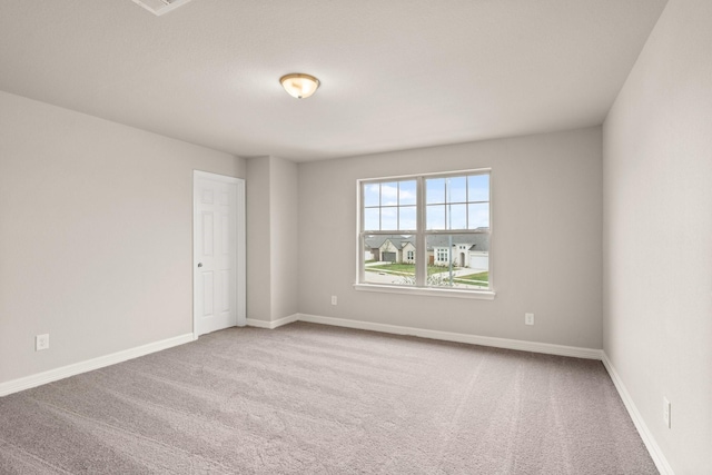 unfurnished room with carpet floors