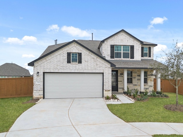 view of front of house featuring a front yard and a porch