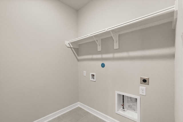 laundry room with electric dryer hookup, gas dryer hookup, and washer hookup