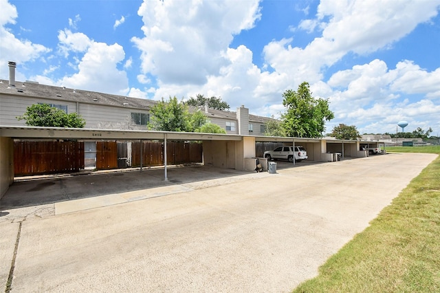 view of car parking with a carport