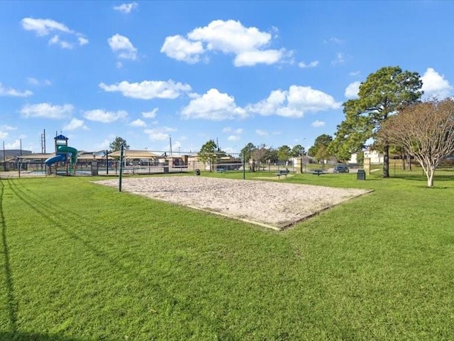 view of community featuring a yard and a playground