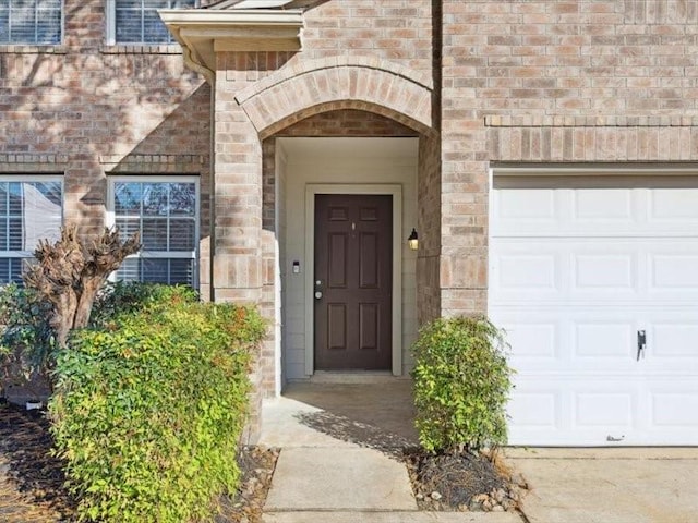 entrance to property with a garage