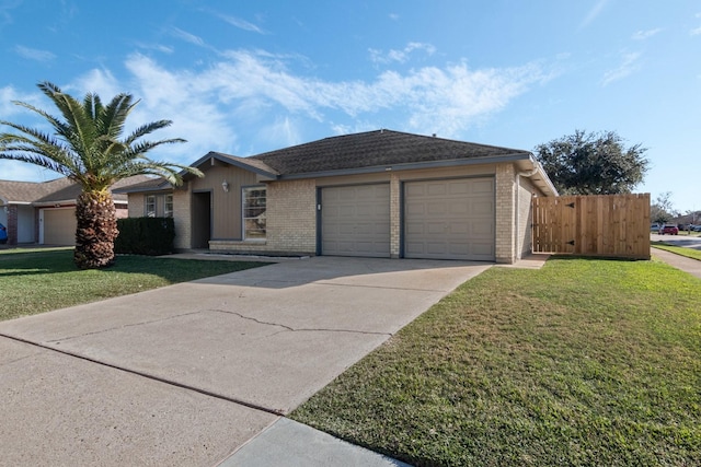 ranch-style house featuring a garage and a front yard