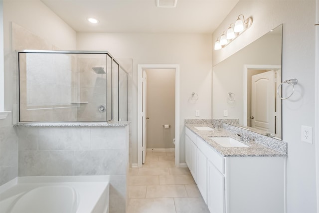 full bathroom featuring tile patterned flooring, vanity, toilet, and plus walk in shower