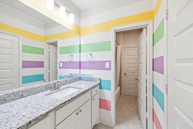 bathroom featuring vanity and a shower with curtain