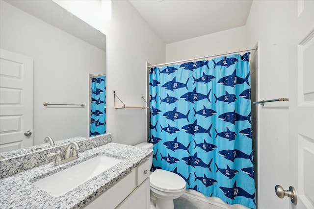 bathroom with toilet, a shower with shower curtain, vanity, and tile patterned flooring